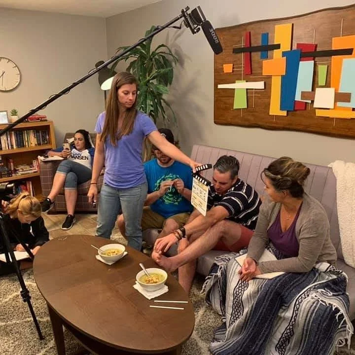 Behind-the-Scenes Film Set Photo featuring Mid-Century Modern Artwork