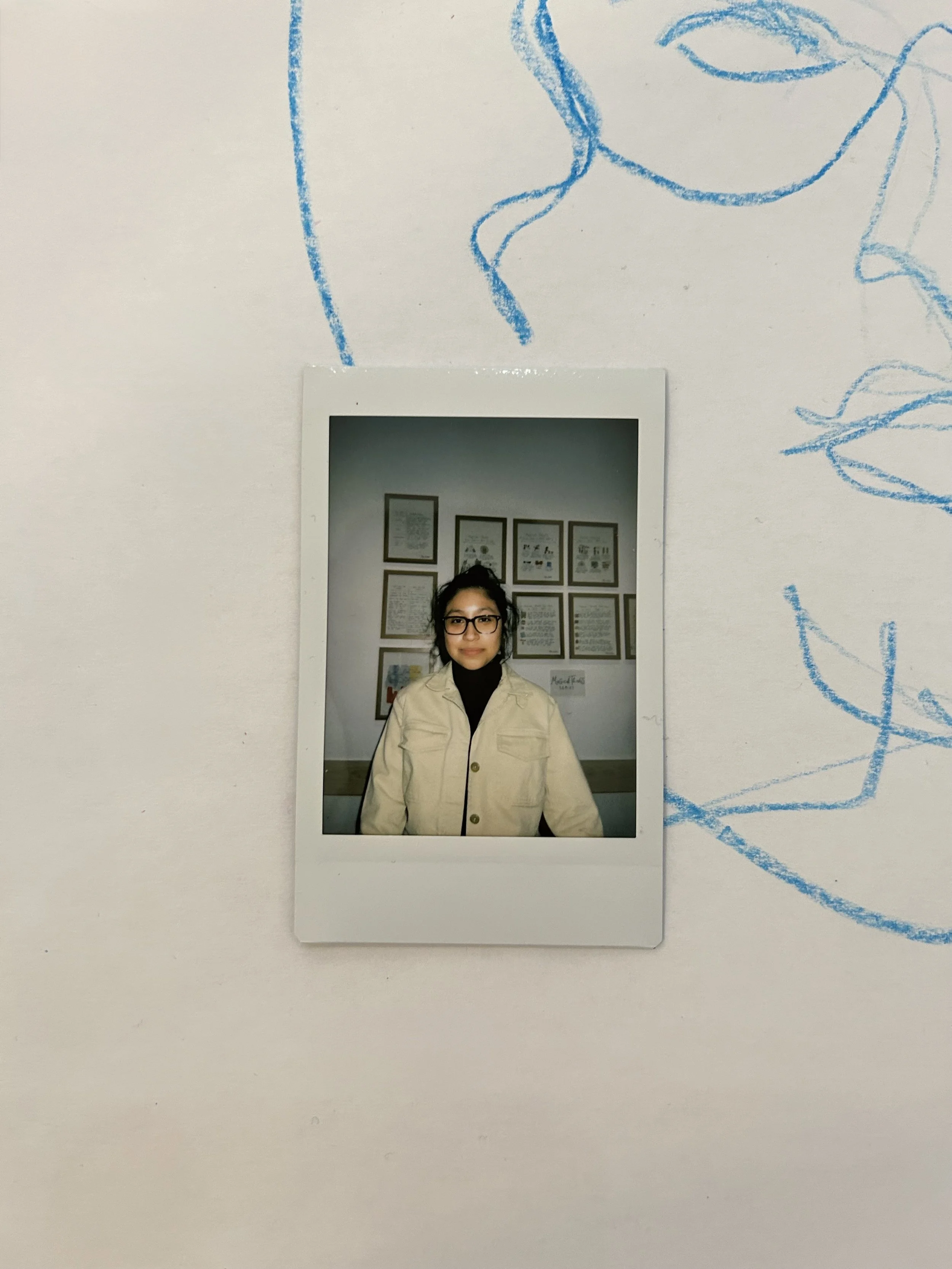 Polaroid headshot of Iridian Castillo over an illustrated portrait