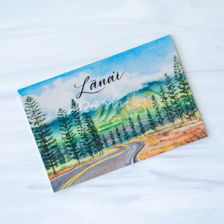 A watercolor landscape postcard of the Palawai pine trees, mountains and Axis deer with the word "Lanai" in the middle.