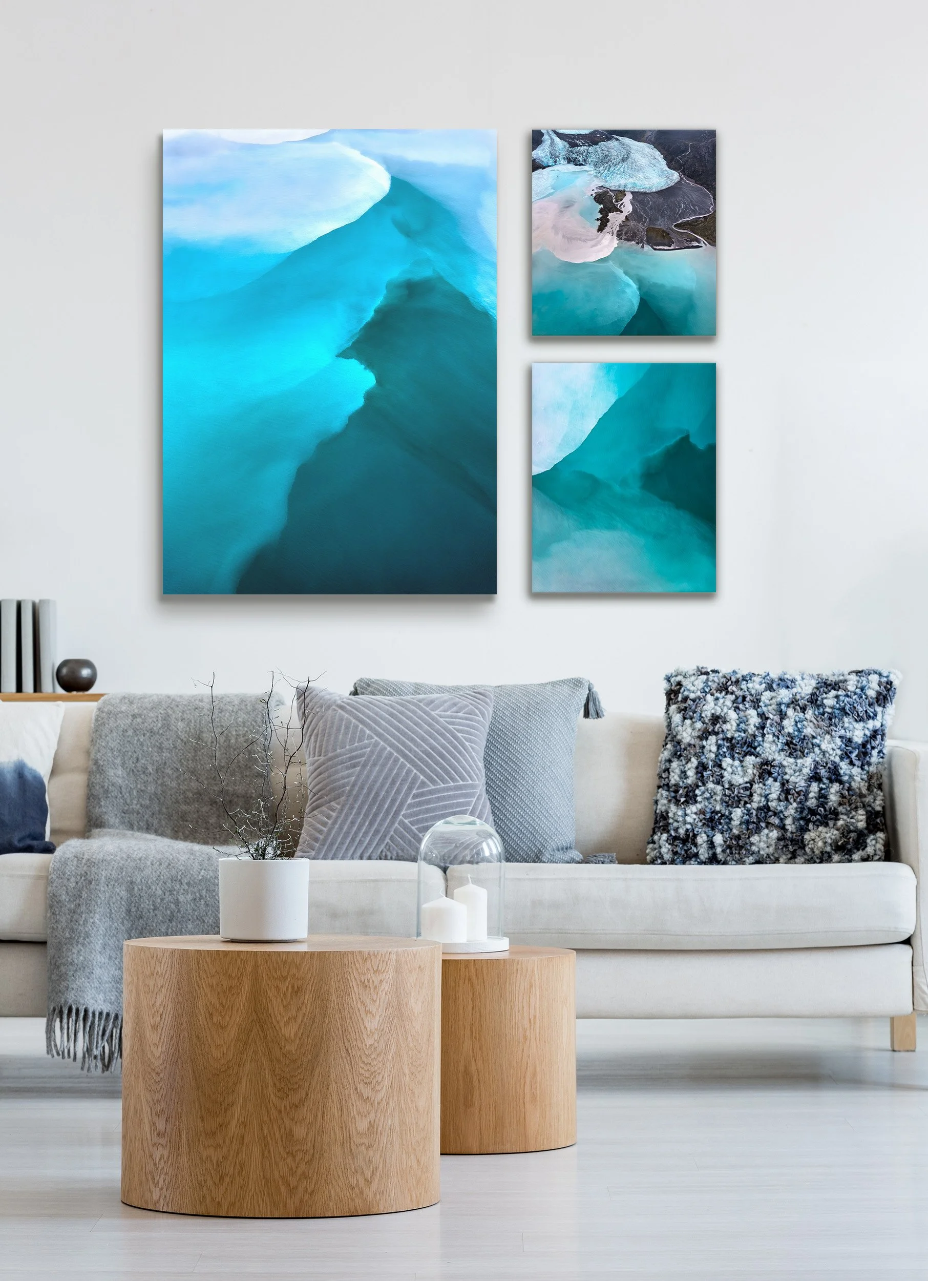 Three Glacial Blue Abstract Artworks Paried Together Over A Couch In A Contemporary Living Room.jpg