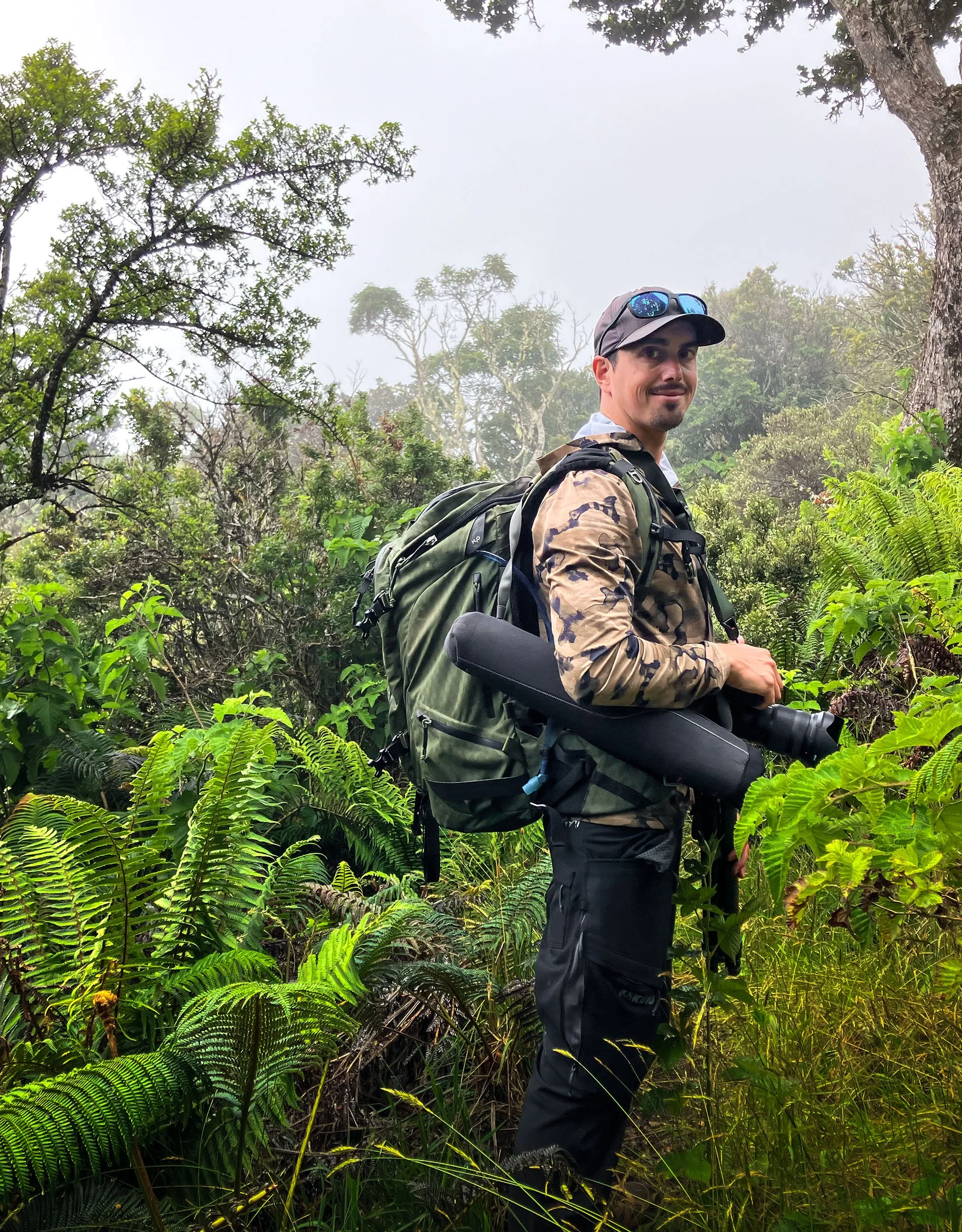 Portrait of fine art photographer Cody Roberts in native Hawaiian forest
