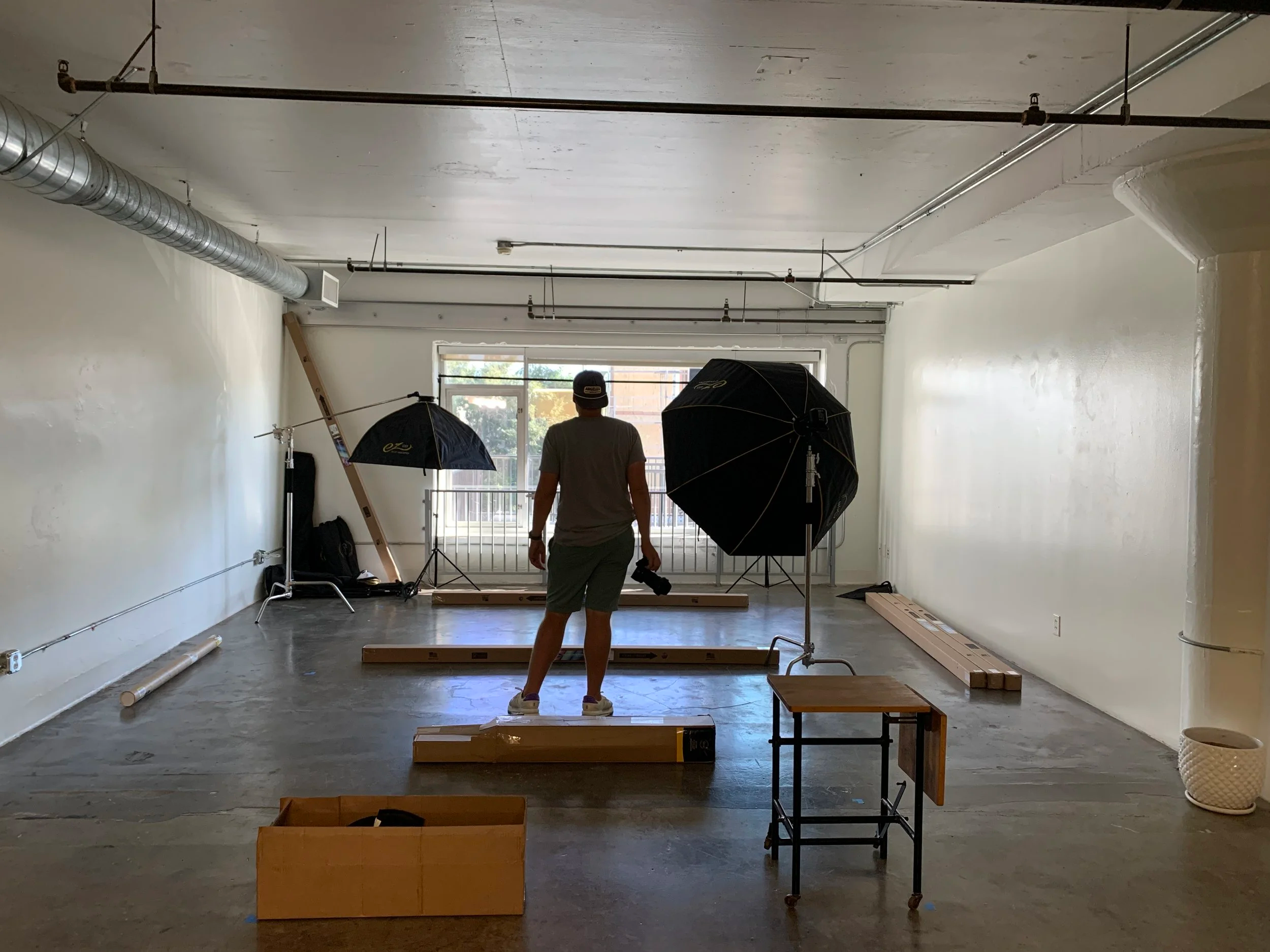Adam Claus in his empty LA pet portrait studio Shuttermutt Photo