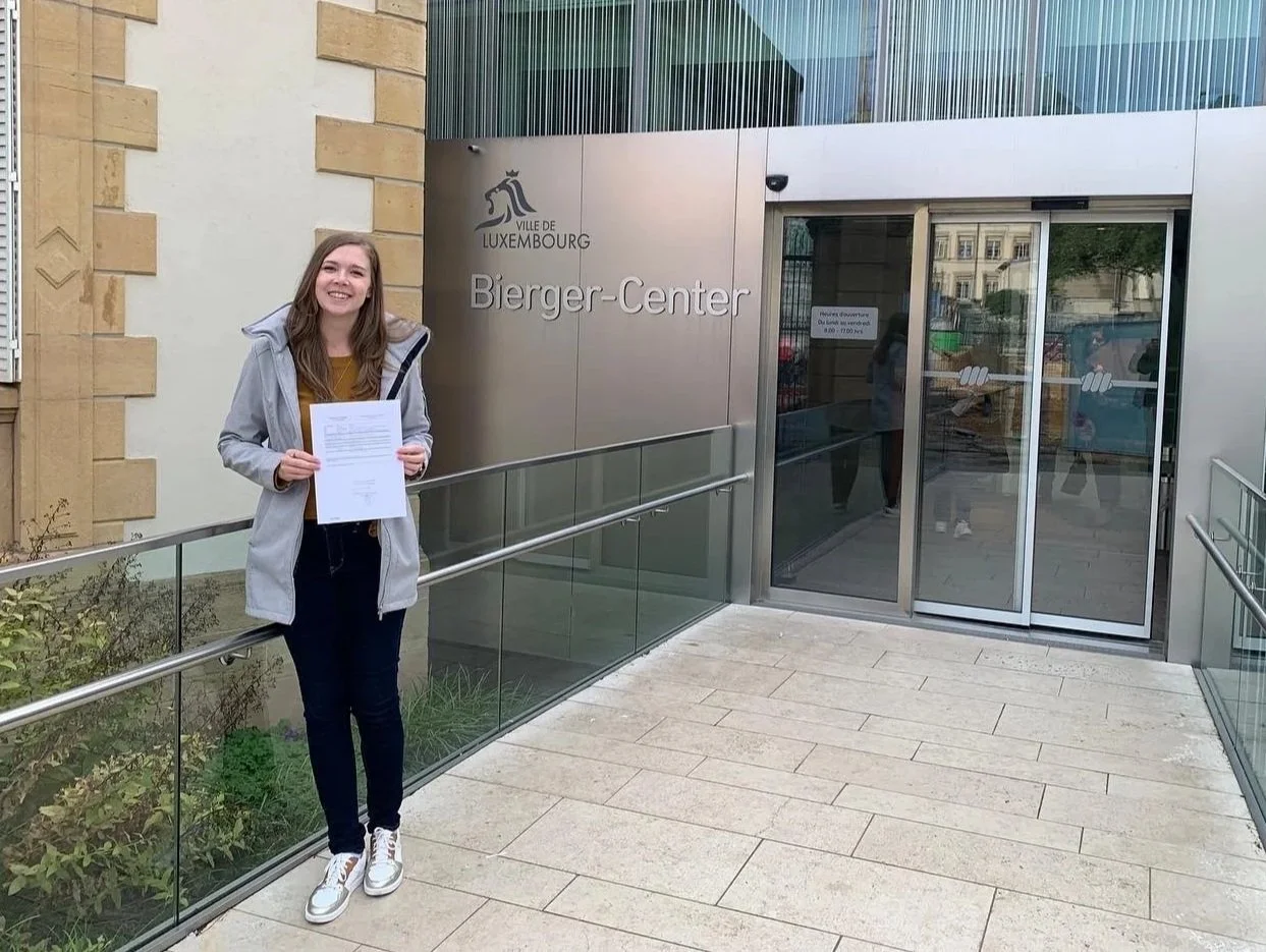 Laura Claus of Shuttermutt Photo in Luxembourg receiving citizenship