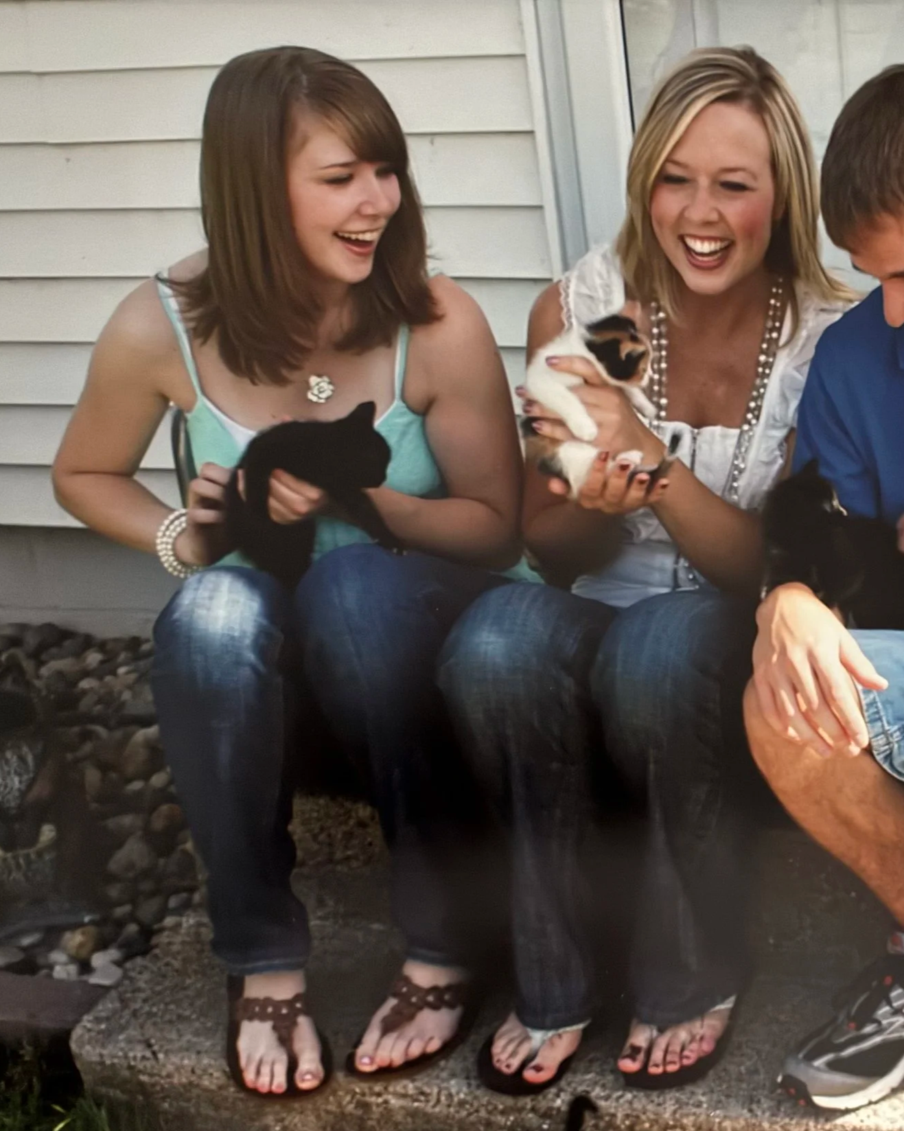 Shuttermutt Photo owner Laura Claus as teenager with pet kittens on farm
