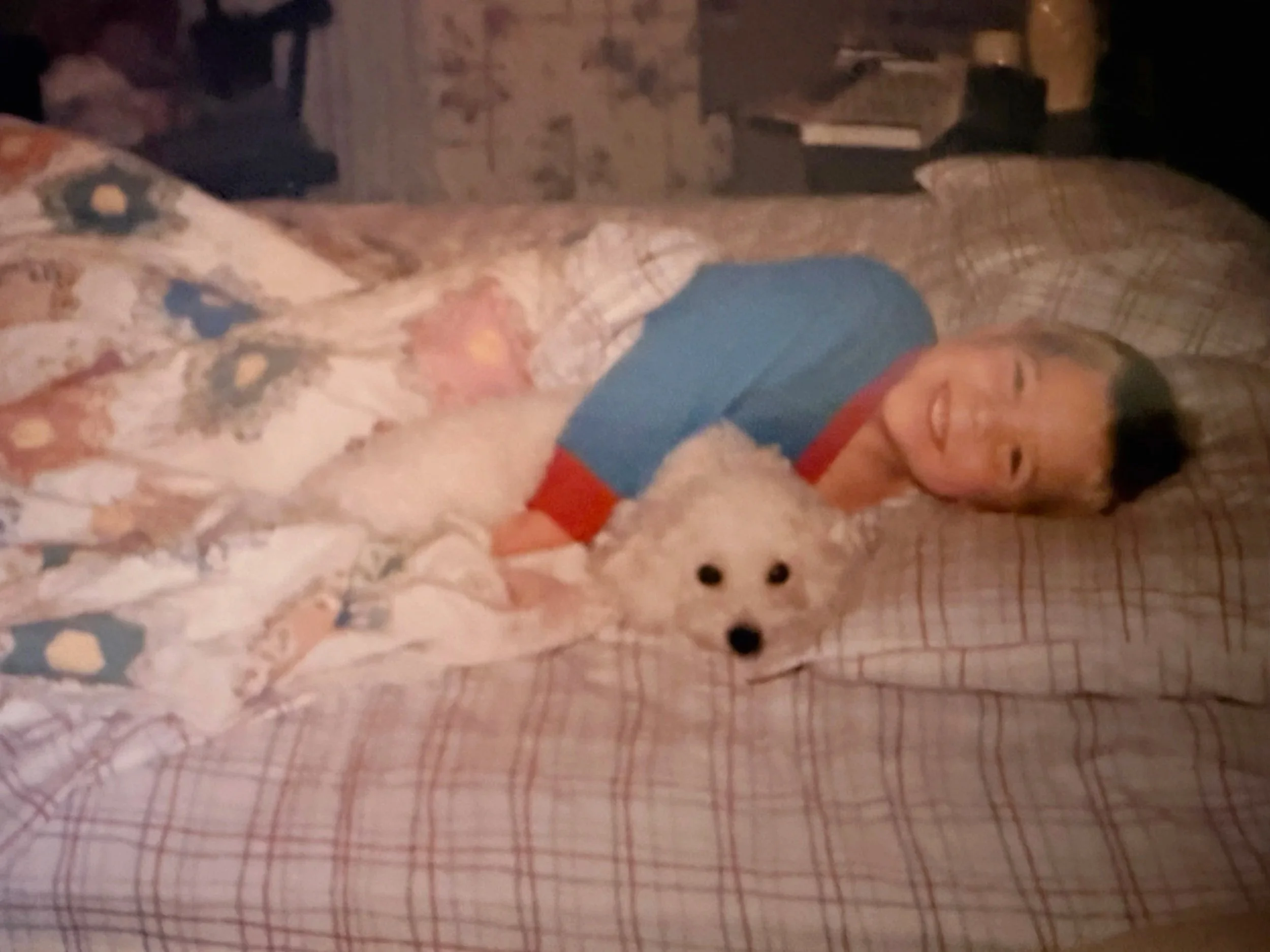 Pet photographer Adam Claus as a child with his pet dog