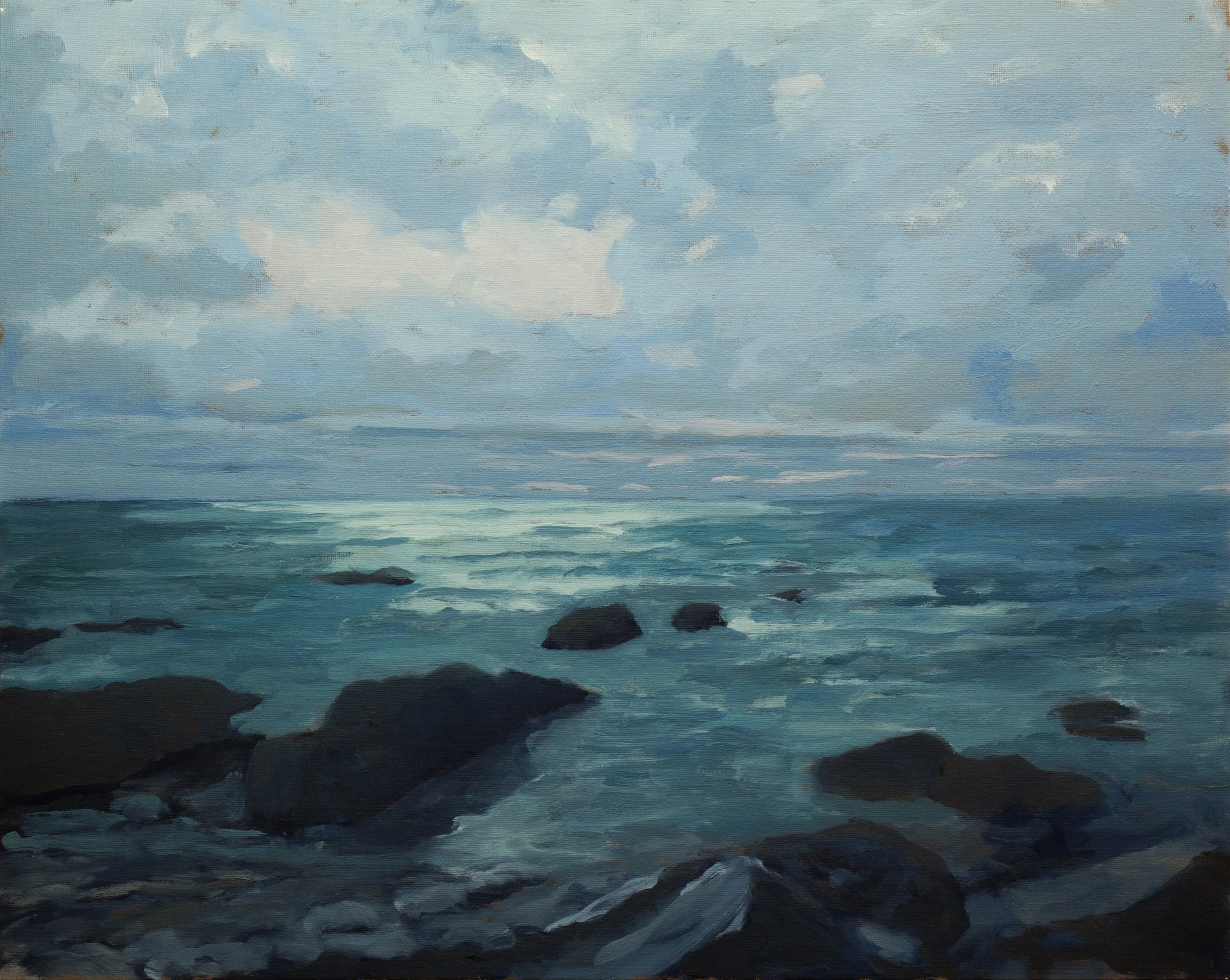 A seascape painting depicting a rocky shoreline under a cloudy sky, with sunlight reflecting on the water.