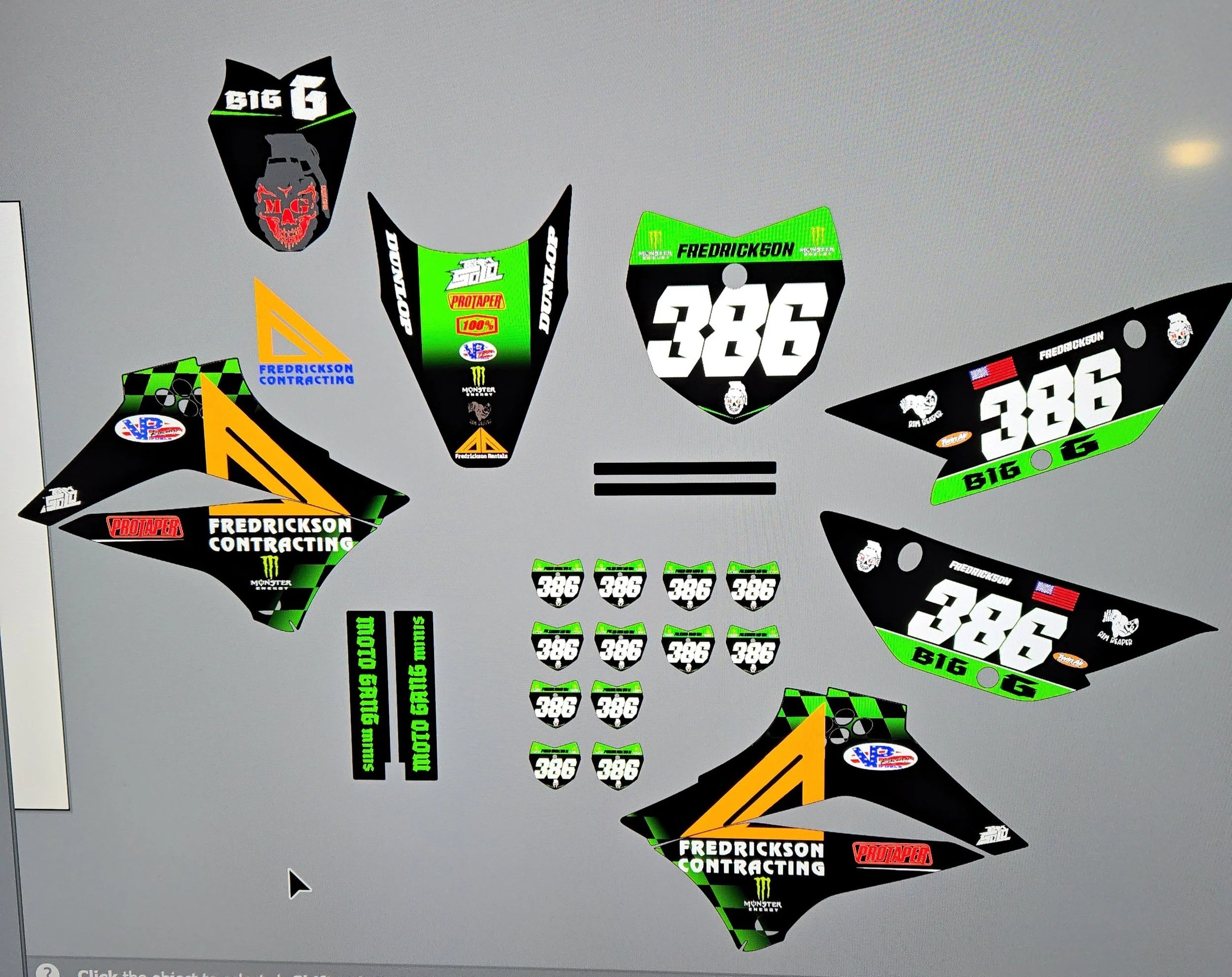 Digital graphic design of motocross graphics and decals with the number 386, Fredrickson, and various sponsor logos including Monster, ProTaper, and more, arranged for customization.