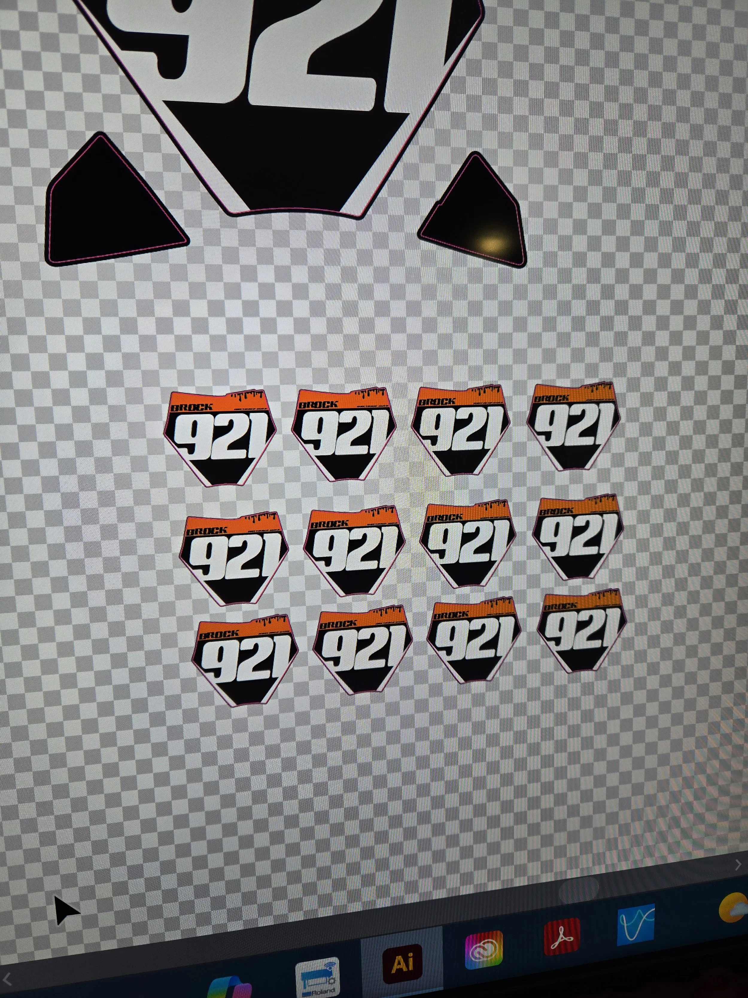 Several stickers with the number 921 and the word 'Brock' in orange and black, arranged in a grid on a transparent background on a computer screen.