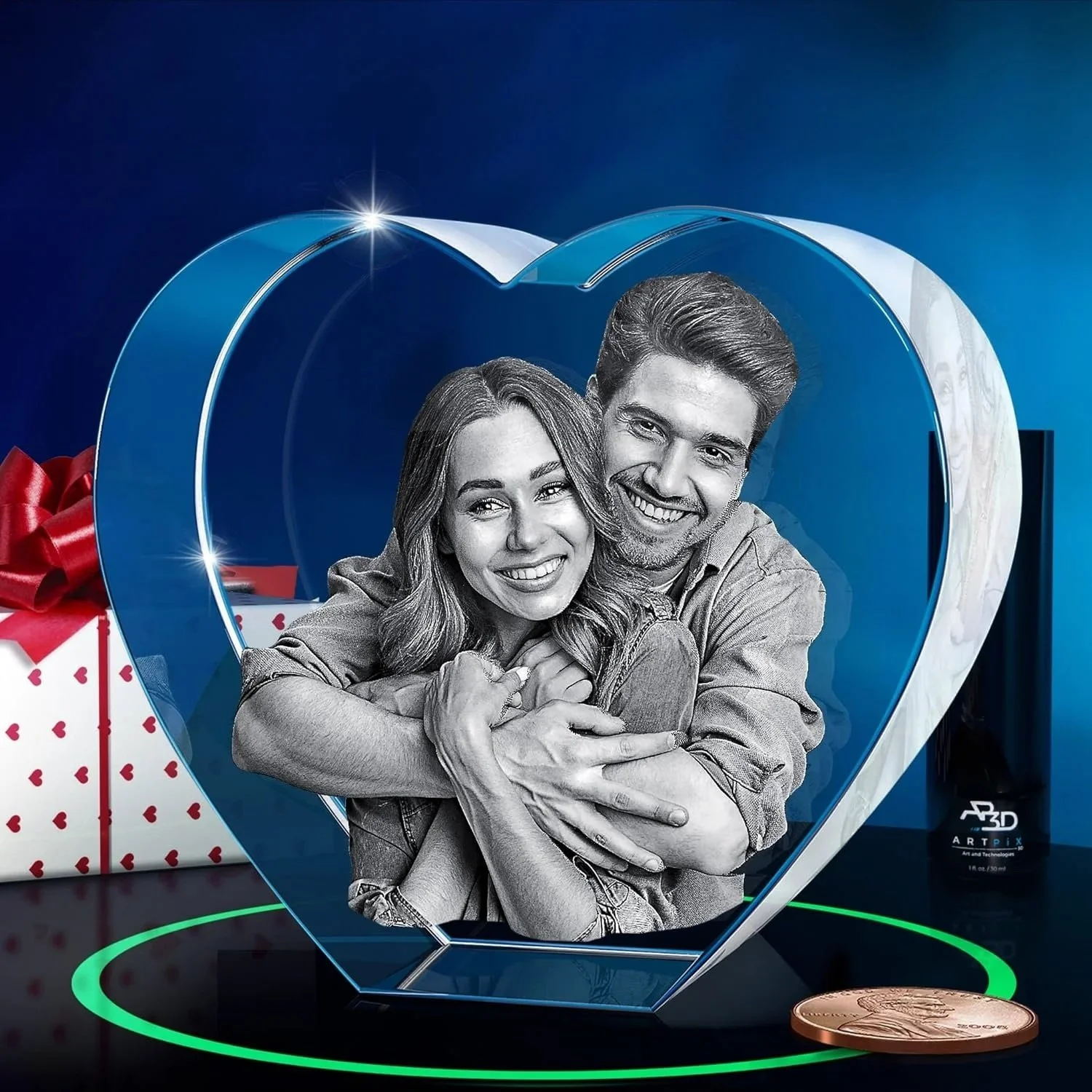 A mixed media image of a smiling couple inside a large blue heart-shaped frame, with an oversized penny coin and a gift box with a red bow in the background.