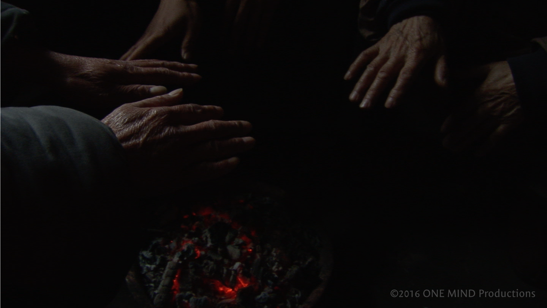OM_stills_warmhands_wm.png