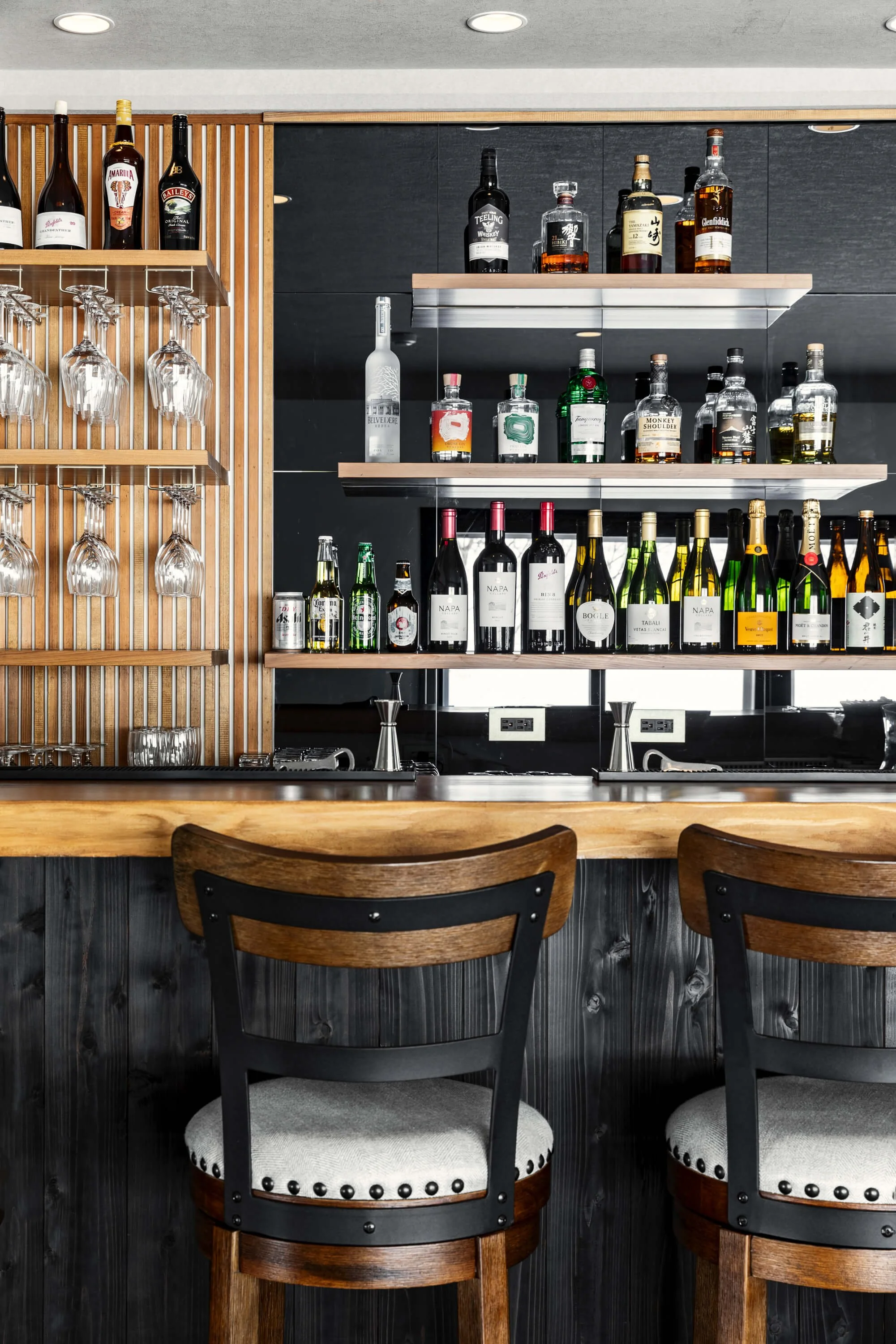 Warm timber features of the apres ski bar at The Residence Myoko