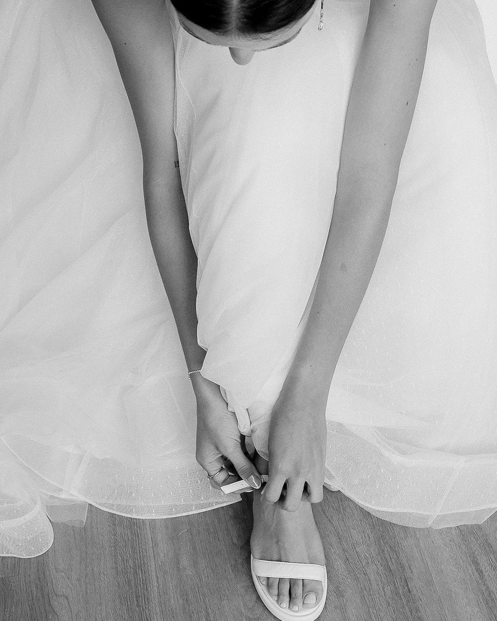 The calm before the celebration ✨
A bride&rsquo;s quiet ritual, slipping into her shoes before stepping into forever.

It&rsquo;s in these subtle details &mdash; the hands, the fabric, the stillness &mdash; where the story finds its poetry. 🤍

#Egam