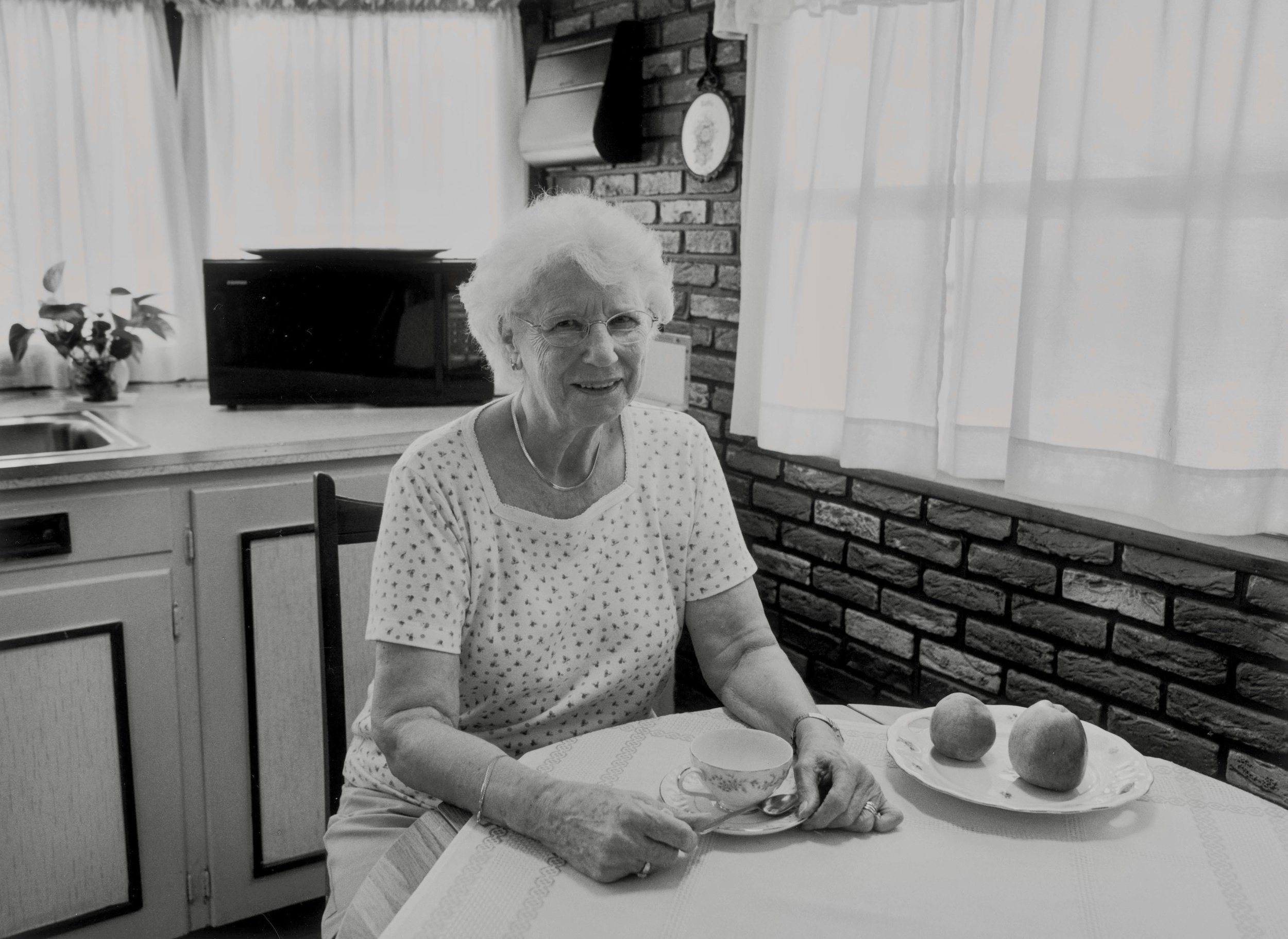 Ruth Carlin Enjoying a Cup of German Coffee in the Kitchen of her Trailer Home - 2005