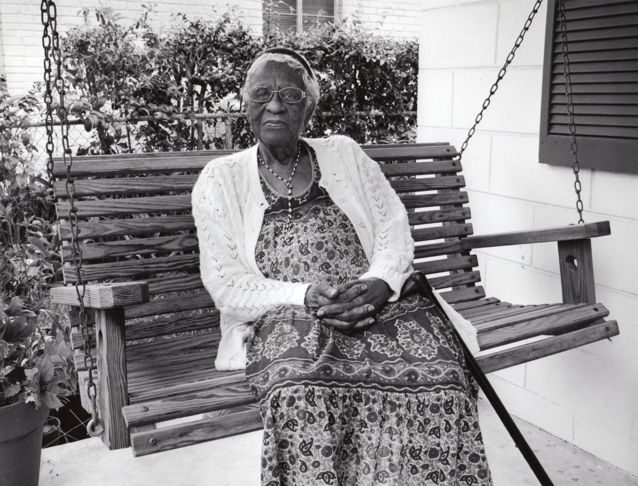 Mrs. Mable Rosa Lee Clark Woodard on the front porch of the home built by her children in 1991 as a gift to her. Winter Park, Florida, 2012