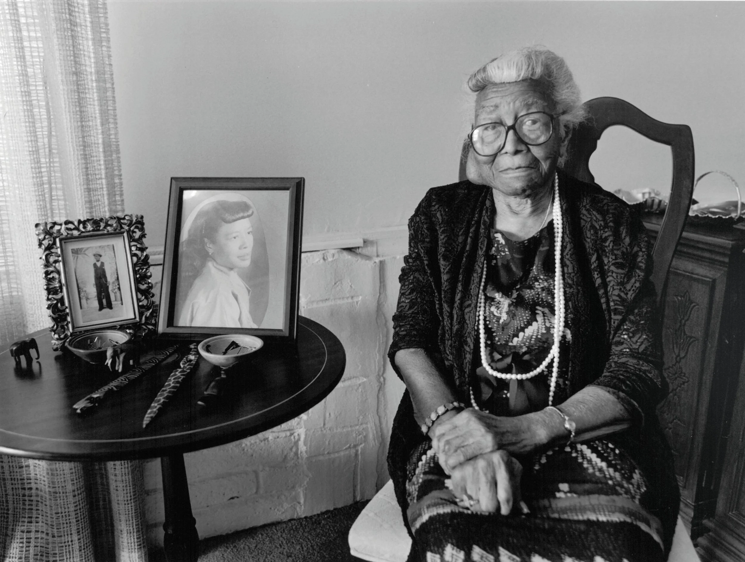 Mrs. Ella Mae Talbert in her favorite sitting room. Originally from South Carolina, she moved to Winter Park in 1938 where she married James Talbert and worked in the home of former Winter Park Mayor, Raymond Green for 54 years. Winter Park, Florida,