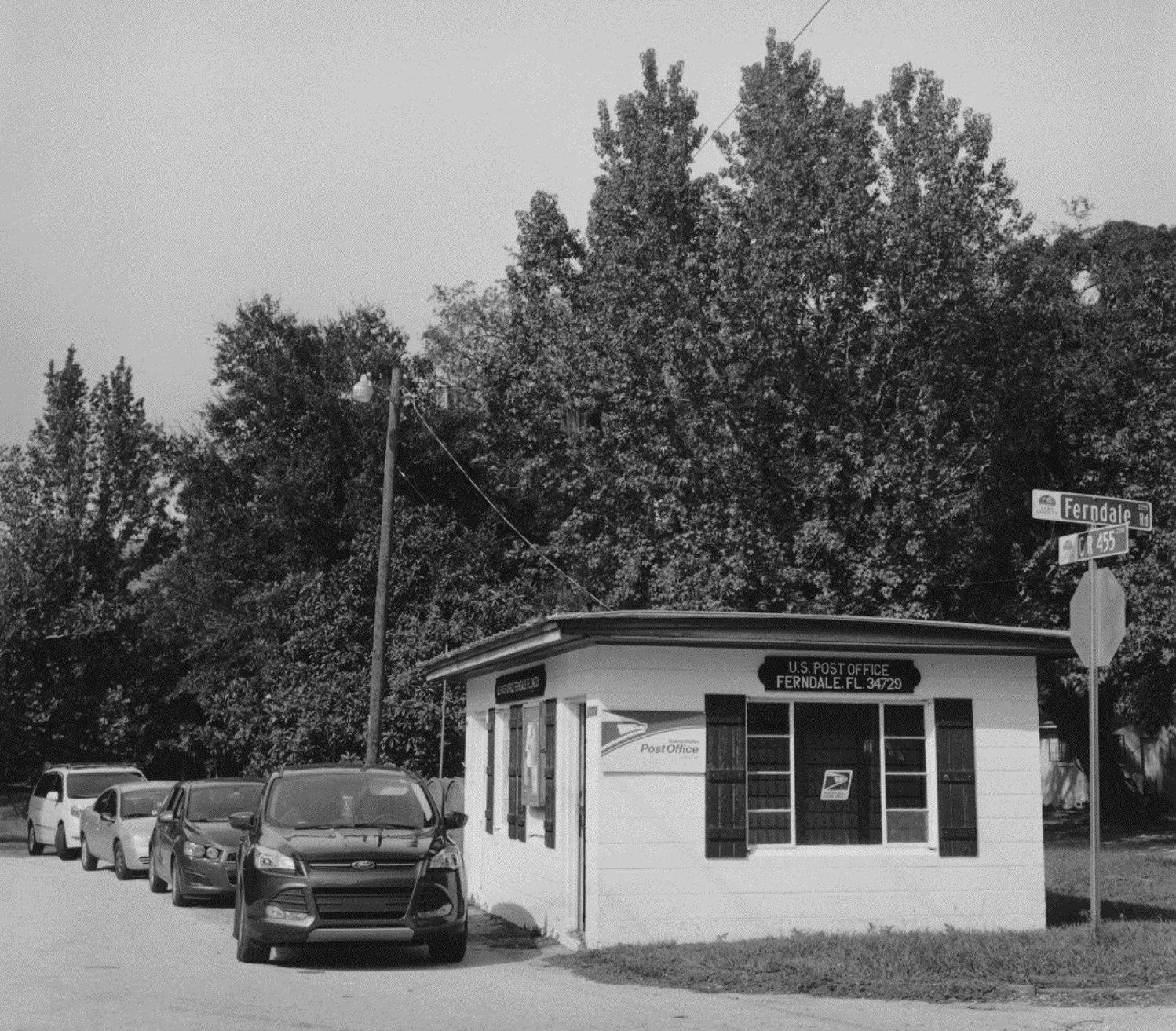 Parents Waiting for School Bus at Local Post Office, Ferndale, Florida, 2017