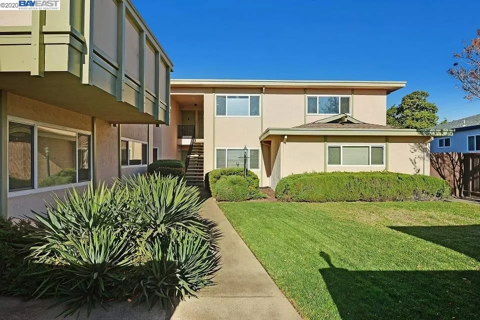 Oranssi technician working on a roof project