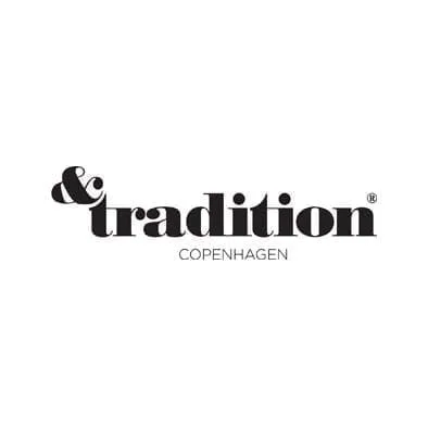 Black and white logo with a stylized ampersand, the word 'tradition' in bold lowercase letters, and 'Copenhagen' in smaller uppercase letters beneath.