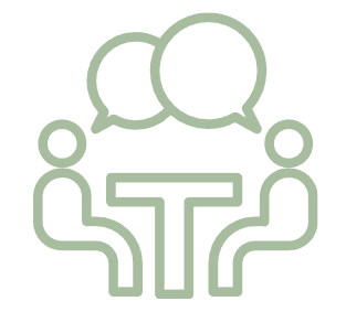 Two people sitting at a table with speech bubbles above their heads, indicating a conversation or discussion l Encompass Growth Counselling l Lyn Le