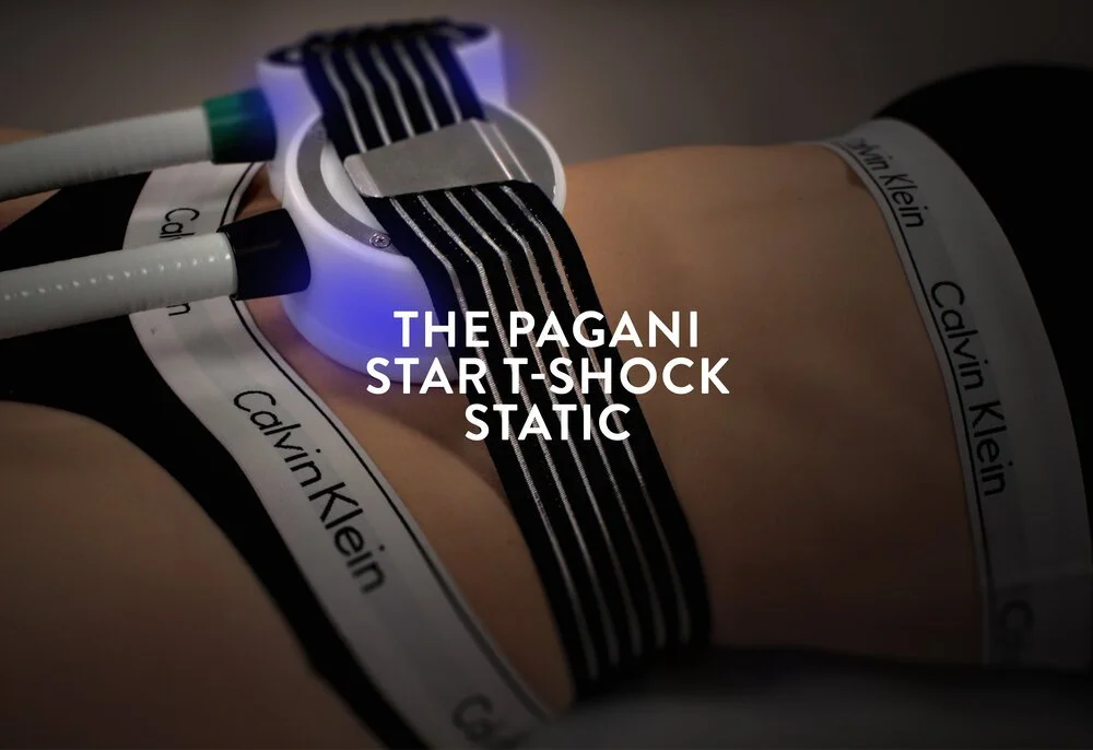 Person wearing a wristband with the text 'Calvin Klein,' connected to a device that appears to deliver shock therapy, with wires attached to the device.