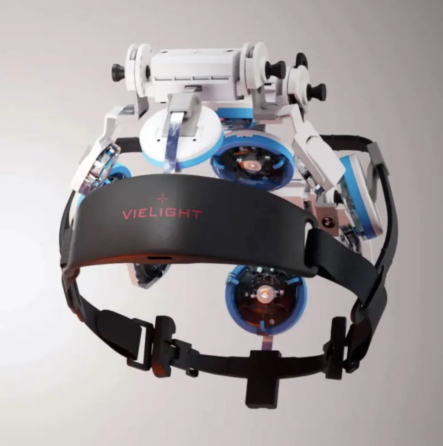 A robot with a black headband labeled 'VIELIGHT' wearing a black skin care light therapy mask.