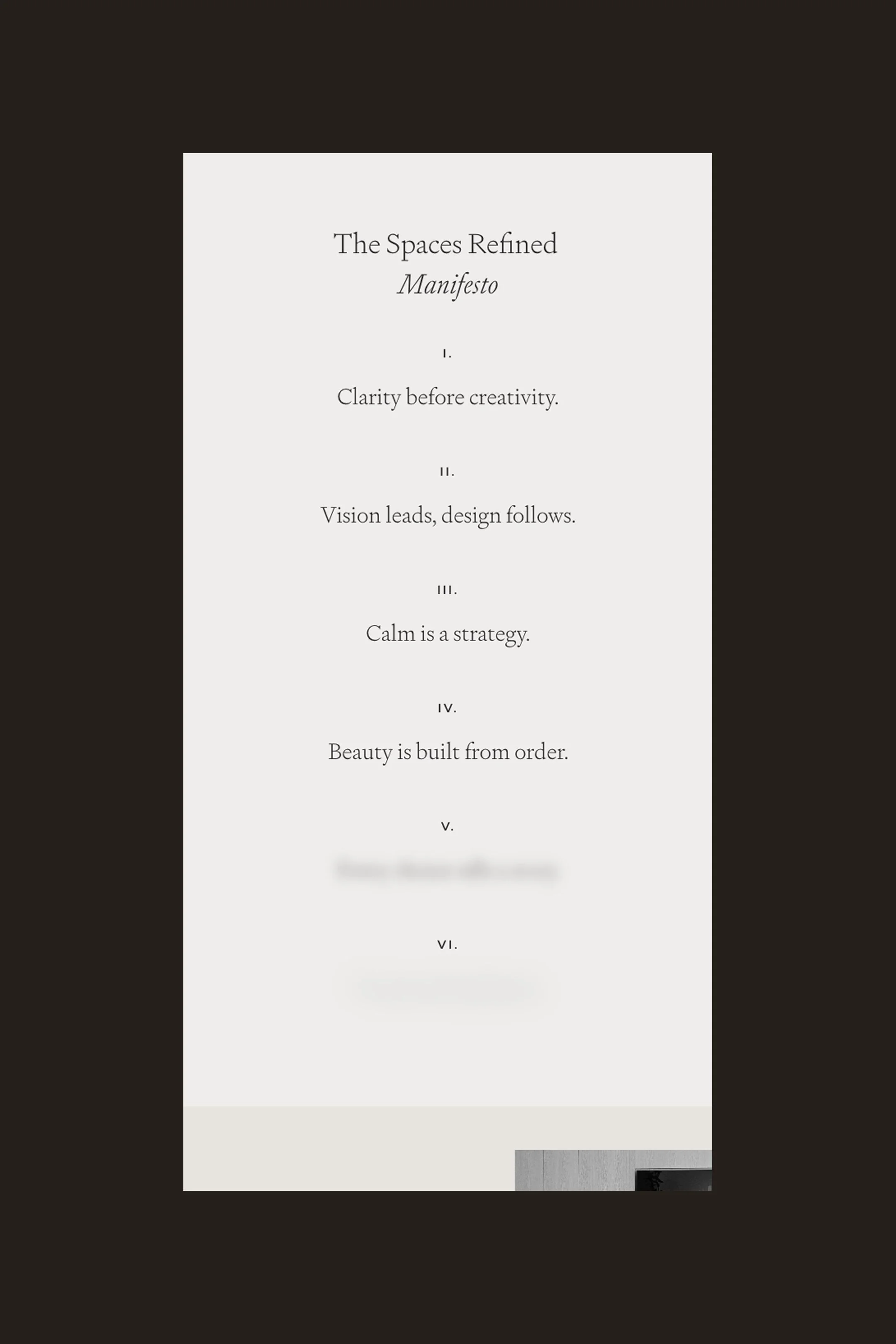 A printed manifesto titled 'The Spaces Refined' with six numbered principles about clarity, vision, calm, order, authenticity, and balance, displayed on a white sheet of paper on a dark background.