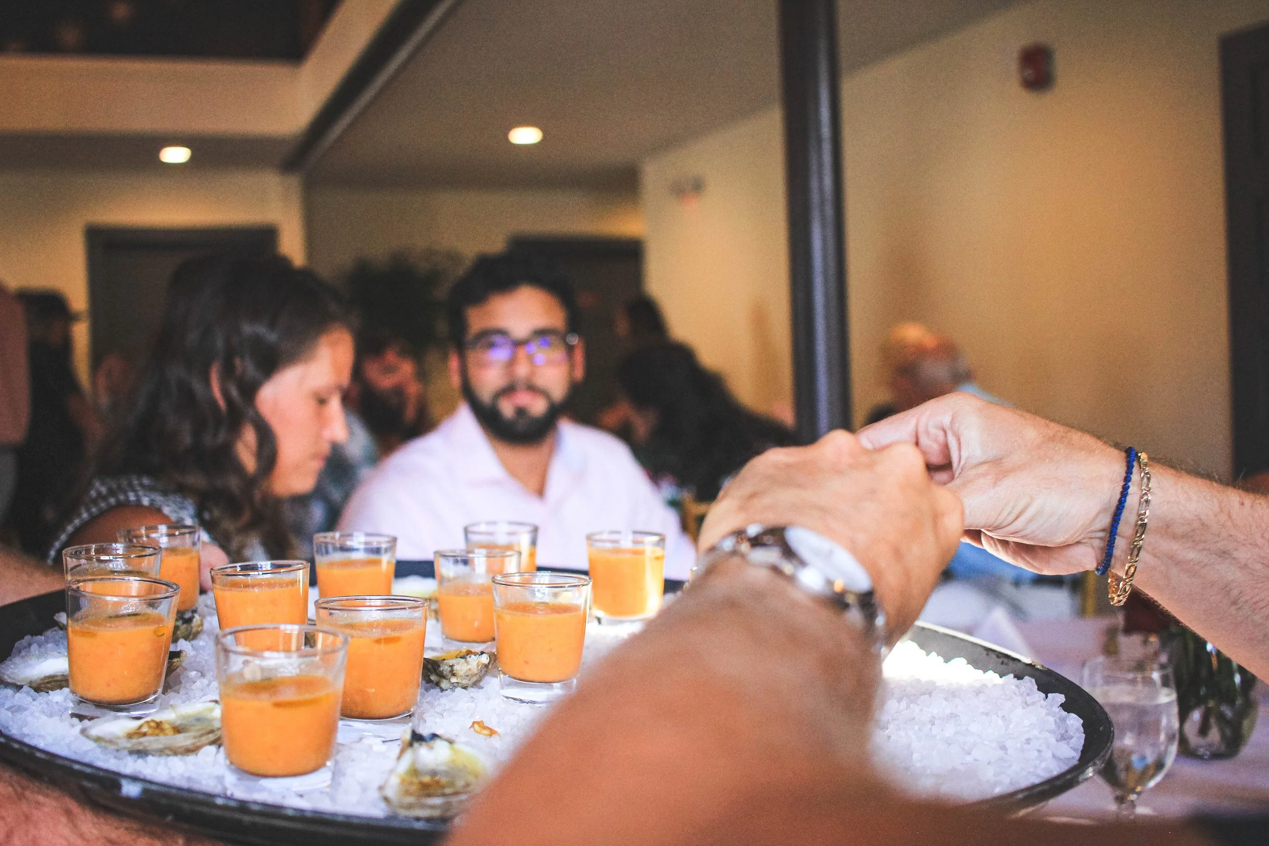 Event Dinner photography by Caleb quire in Charleston oysters