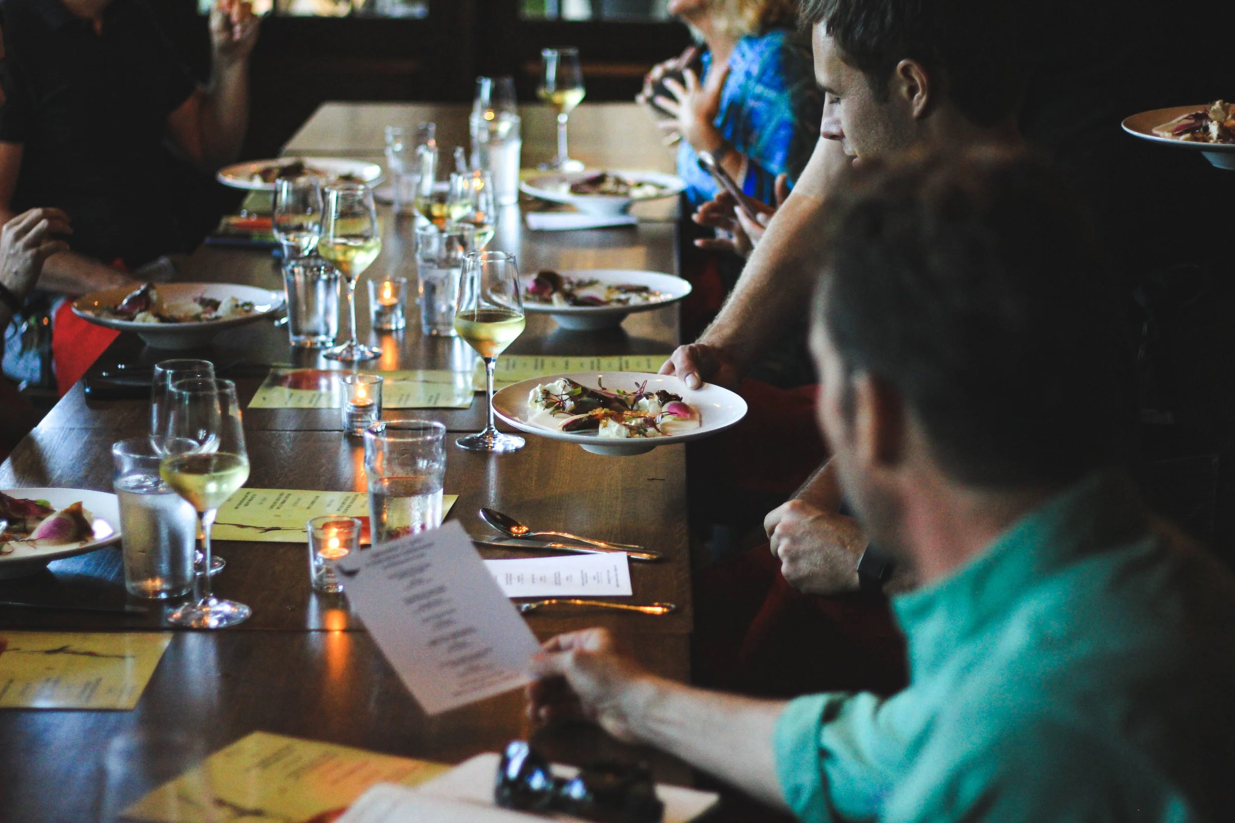 first dish arrives at special dinner event photography done by Caleb quire
