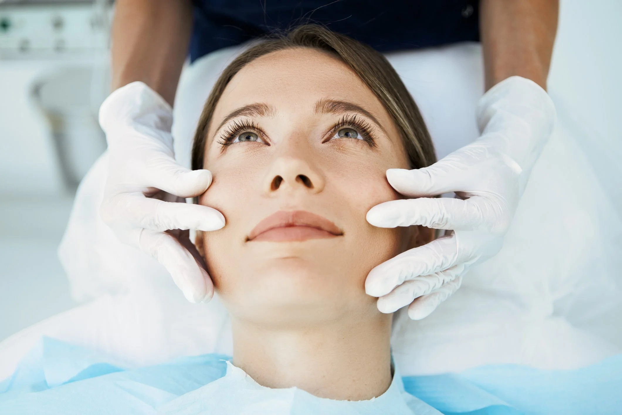 Clean, professional medical spa treatment room with neutral tones at Transformation Plus in Tysons