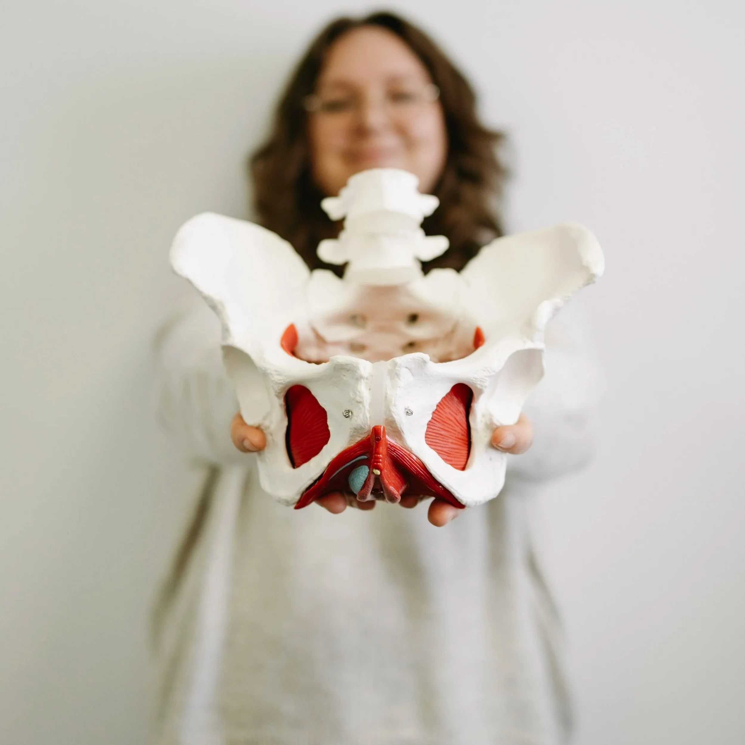 Close-up of medical diagrams and illustrations of the human body from anatomical charts or textbooks.