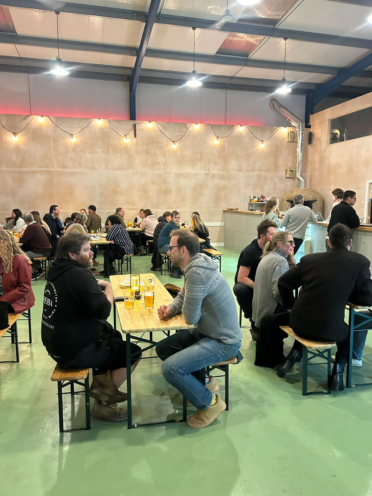 Inside our taproom seating area, a large space which is suitable for groups big and small. We're family friendly and welcome dogs.
