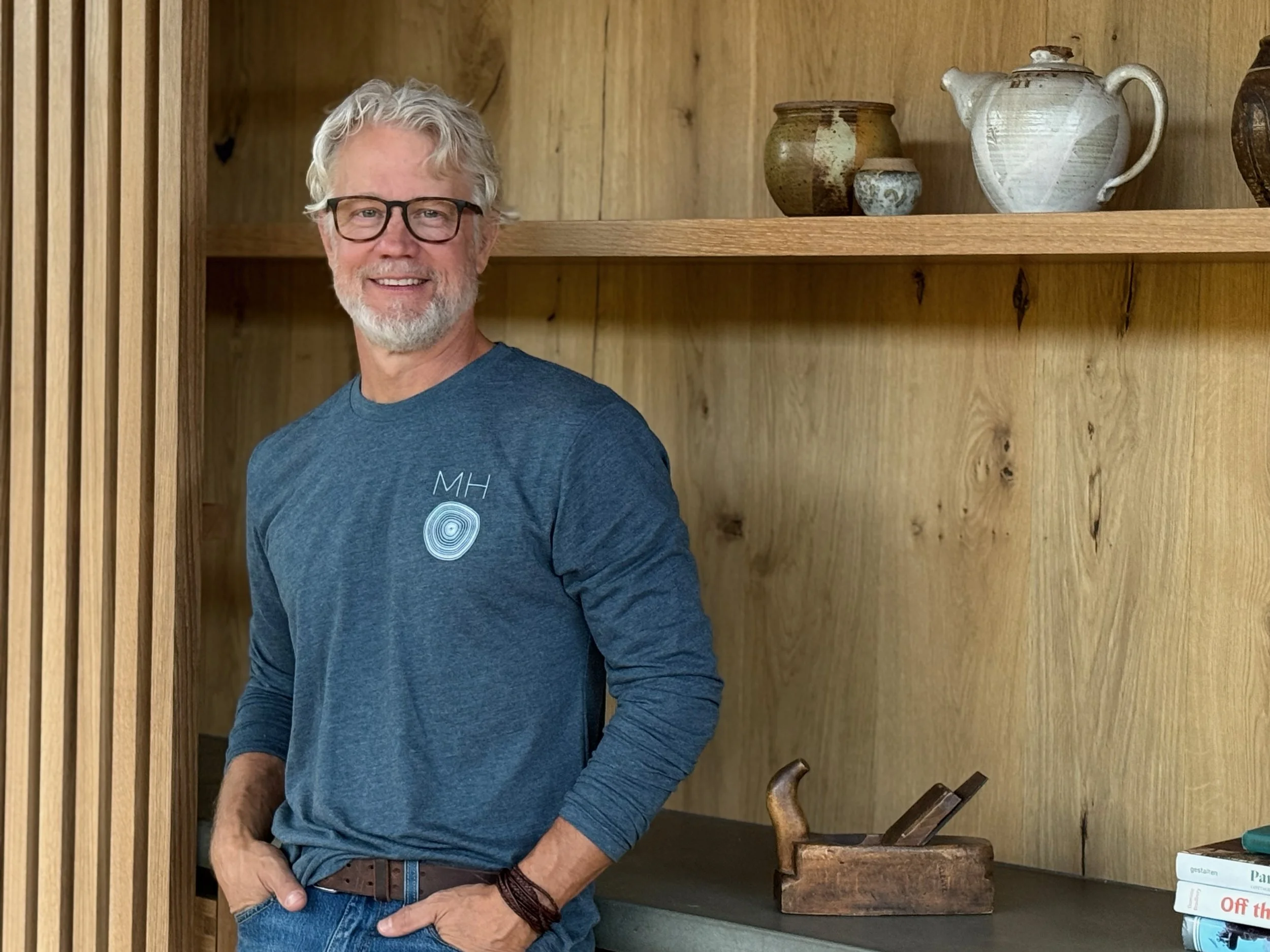 Marc Hunter headshot with cabinets