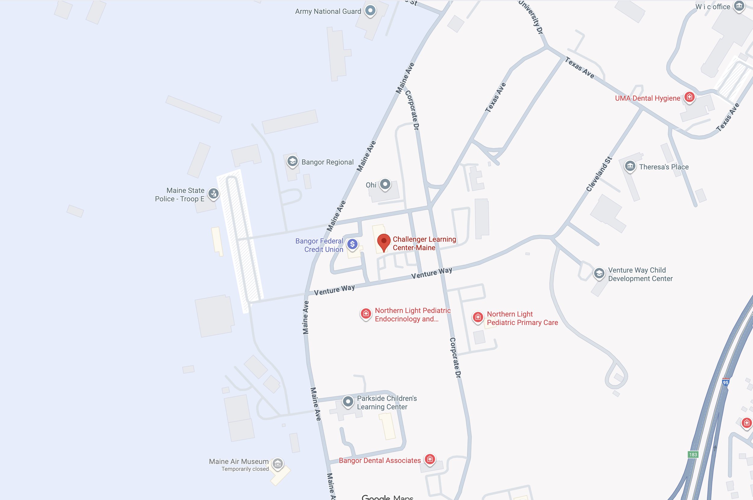 A digital map showing the area around Challenger Learning Center-Maine, with nearby landmarks including Bangor Regional Medical Center, Maine State Police - Troop E, Bangor Federal Credit Union, and Maine Air Museum. Streets include Maine Ave, Venture Way, and Corporate Dr.