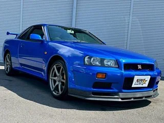 2000 Nissan Skyline GT-R BNR34 in blue, imported from Chiba Japan — rare JDM turbo 4WD coupe with 13,000 km.