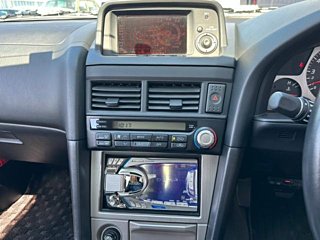 2000 Nissan Skyline GT-R BNR34 in blue, imported from Chiba Japan — rare JDM turbo 4WD coupe with 13,000 km.