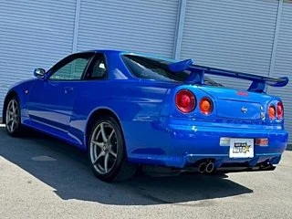 2000 Nissan Skyline GT-R BNR34 in blue, imported from Chiba Japan — rare JDM turbo 4WD coupe with 13,000 km.
