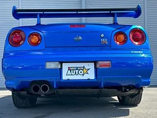 2000 Nissan Skyline GT-R BNR34 in blue, imported from Chiba Japan — rare JDM turbo 4WD coupe with 13,000 km.