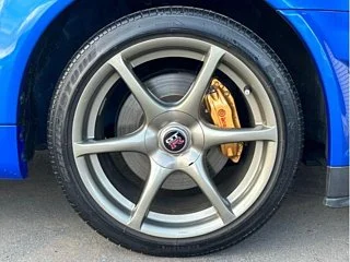2000 Nissan Skyline GT-R BNR34 in blue, imported from Chiba Japan — rare JDM turbo 4WD coupe with 13,000 km.