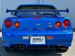 2000 Nissan Skyline GT-R BNR34 in blue, imported from Chiba Japan — rare JDM turbo 4WD coupe with 13,000 km.