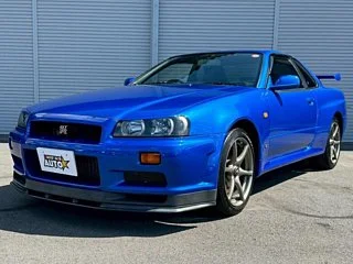 2000 Nissan Skyline GT-R BNR34 in blue, imported from Chiba Japan — rare JDM turbo 4WD coupe with 13,000 km.