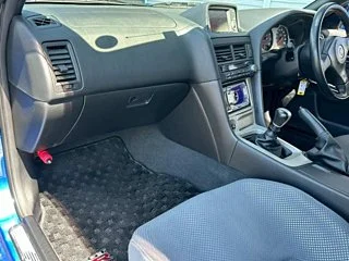 2000 Nissan Skyline GT-R BNR34 in blue, imported from Chiba Japan — rare JDM turbo 4WD coupe with 13,000 km.