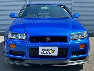 2000 Nissan Skyline GT-R BNR34 in blue, imported from Chiba Japan — rare JDM turbo 4WD coupe with 13,000 km.