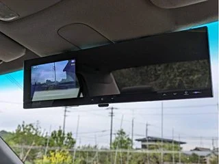 Classic JDM car exterior with clean body lines and factory aero kit