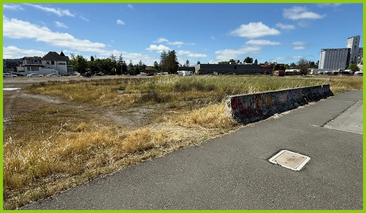  Walking down East D Street, we see another large, vacant parcel. 