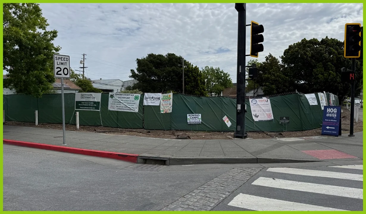  Continuing on D Street, we come to Petaluma Blvd and find another fenced lot on the corner. 