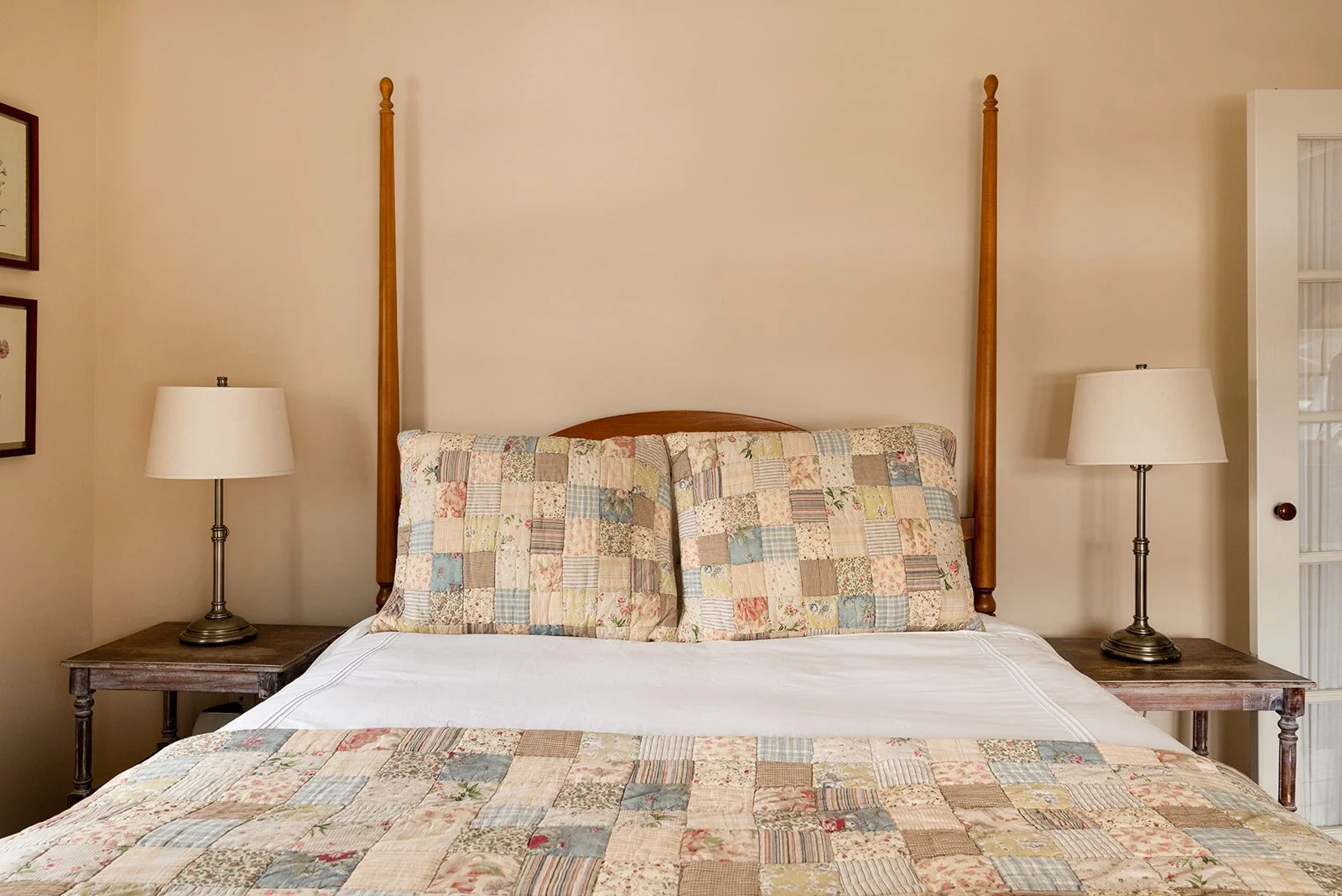 Queen bedroom in Butler's Hideaway Stowe Vermont with hardwood floors and traditional cottage-style design