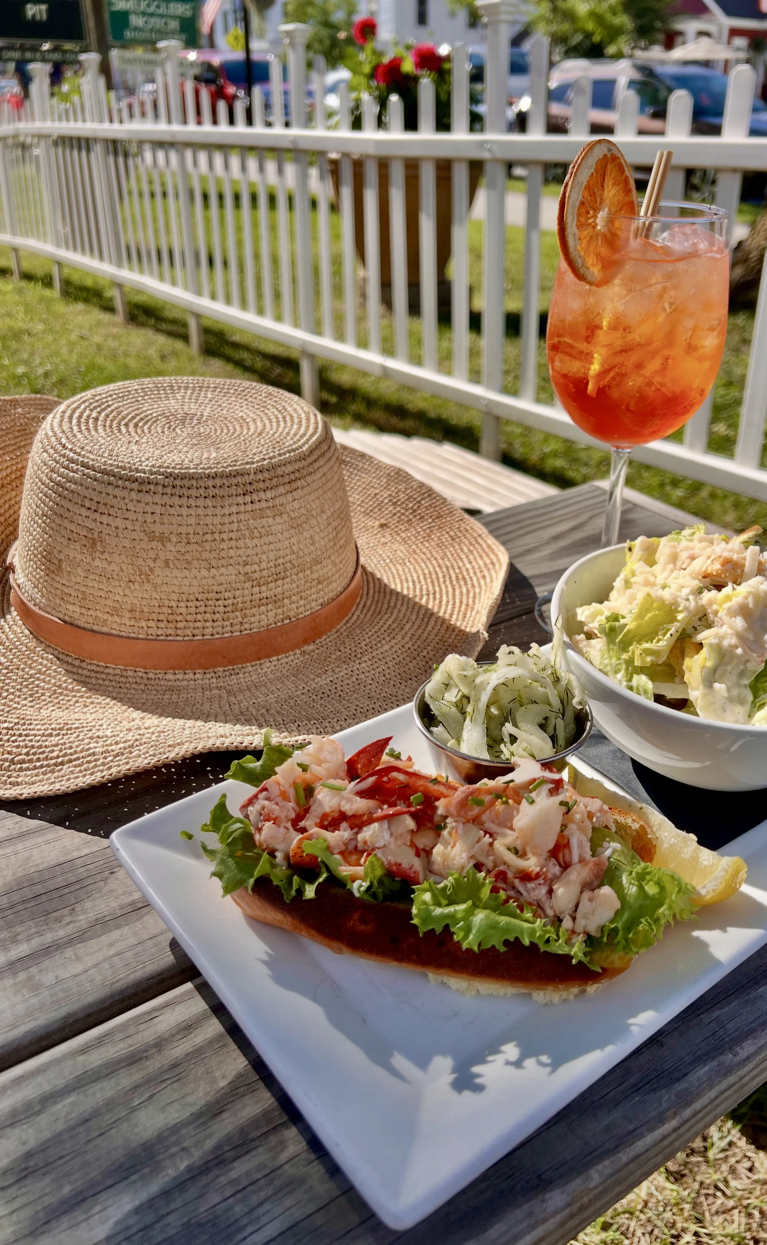 Outdoor dining in Stowe Vermont featuring food at Butler's Pantry on a sunny patio table