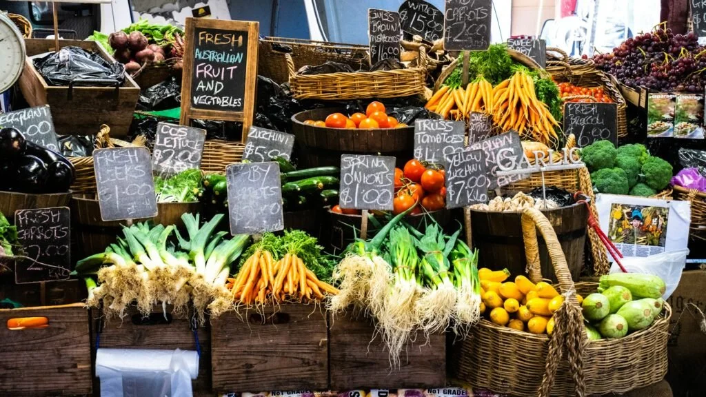 Stowe Farmers Market in Vermont with fresh produce, vegetables and artisan goods on display