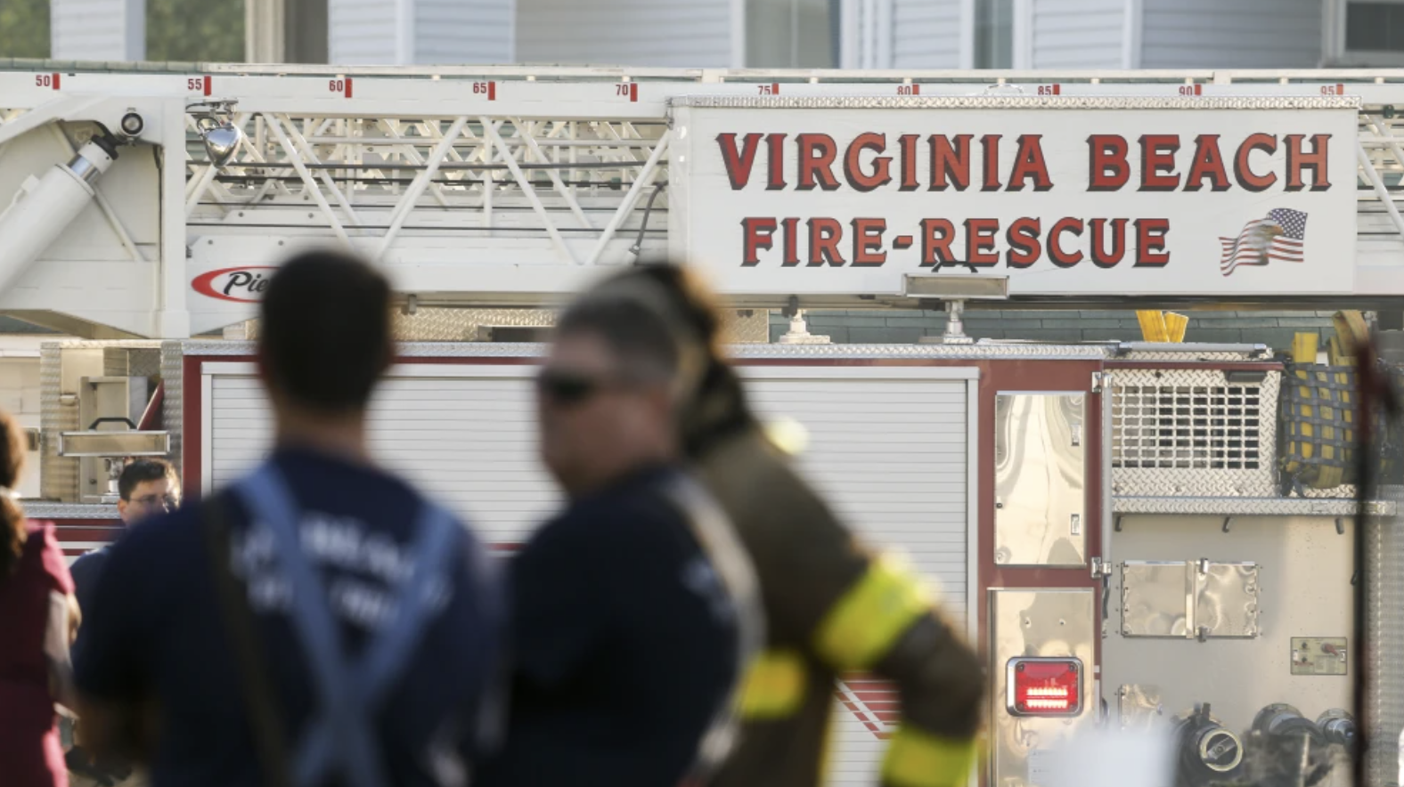 Virginia Beach fire rescue truck and people in the foreground