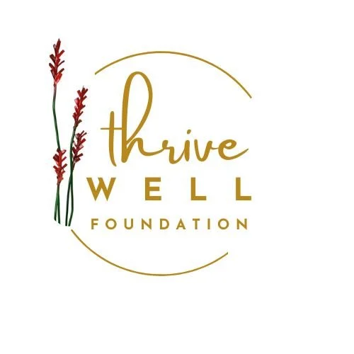 Thrive Well Foundation logo with ocotillo plant, gold circle and gold text.